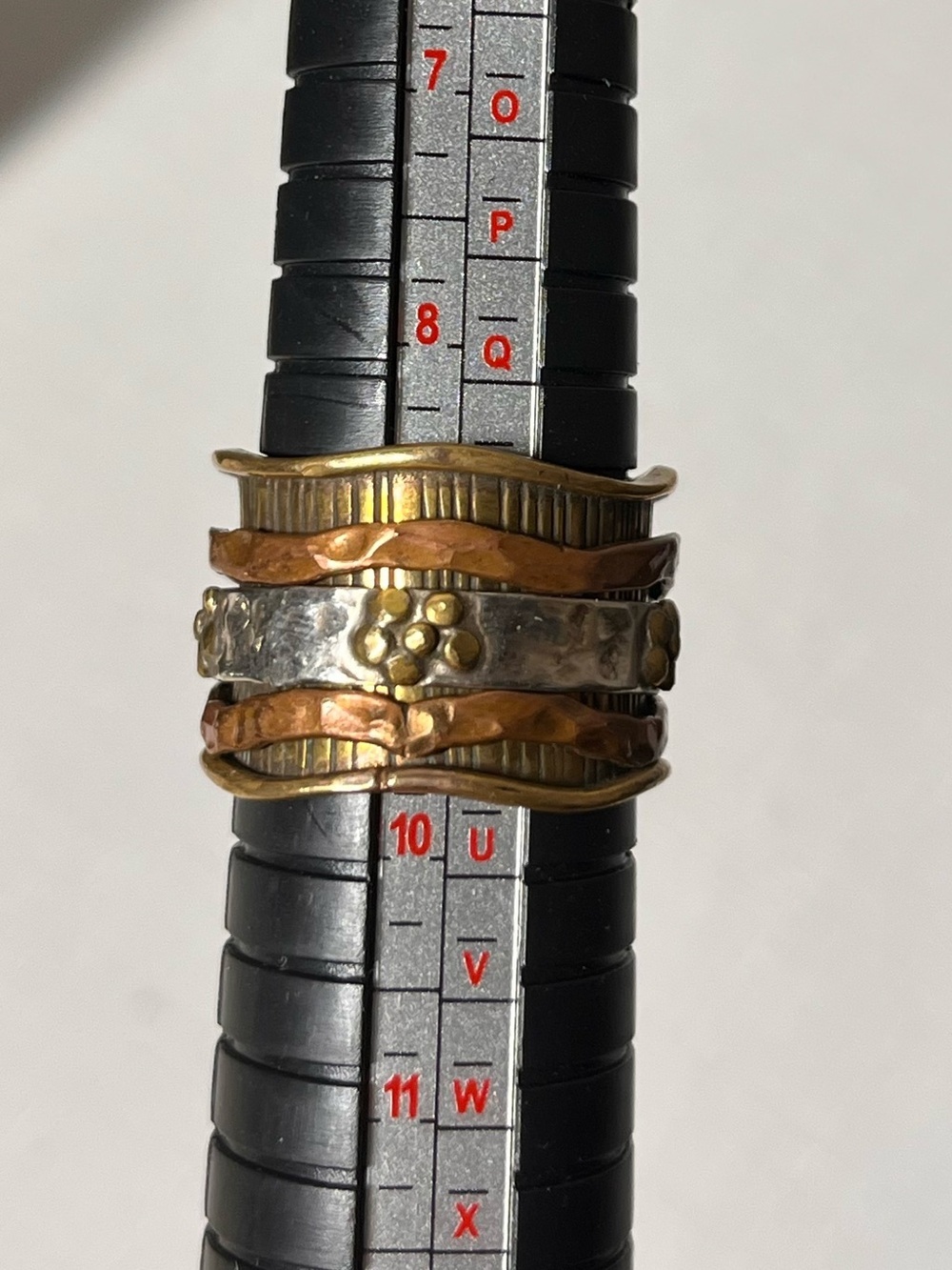 Floral Band three-tone spinner ring, wavy brass & copper accents. Sz 9